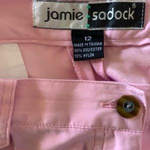 Top pink with grey trim.